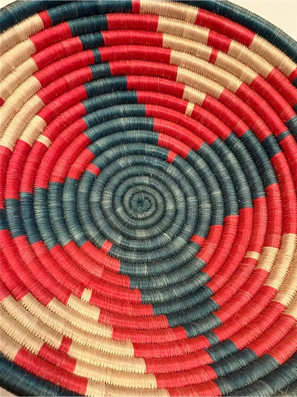 Vintage Handwoven Decorative Wall Basket in Teal, Red, and Cream